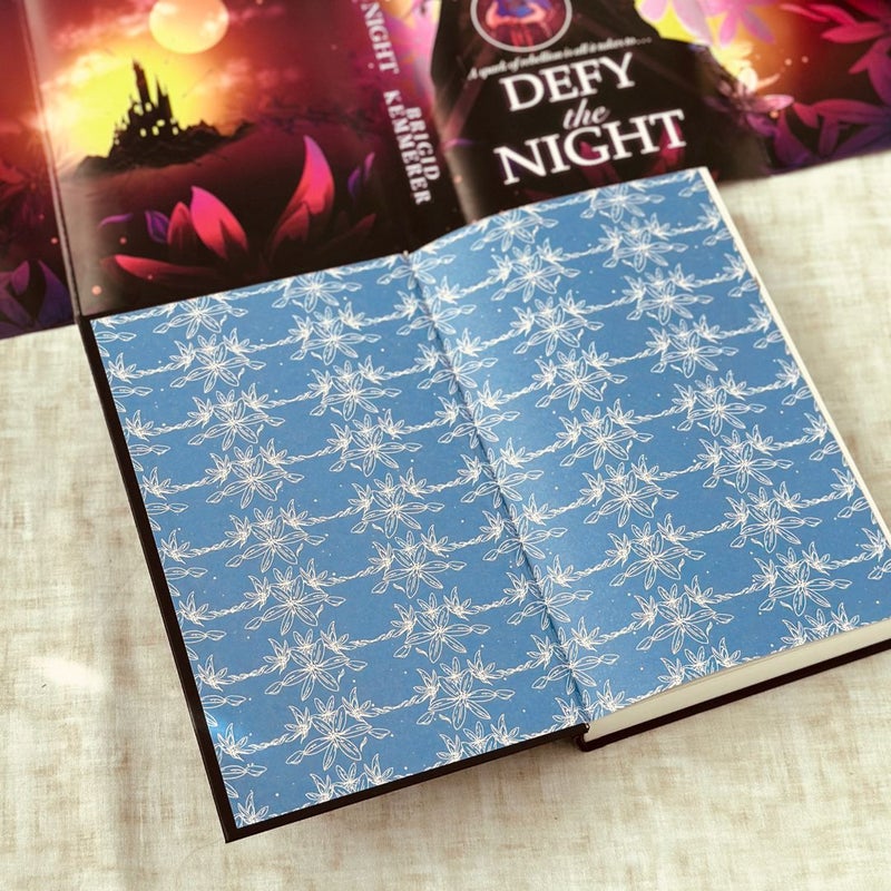 Signed Defy the Night with reversed dust jacket