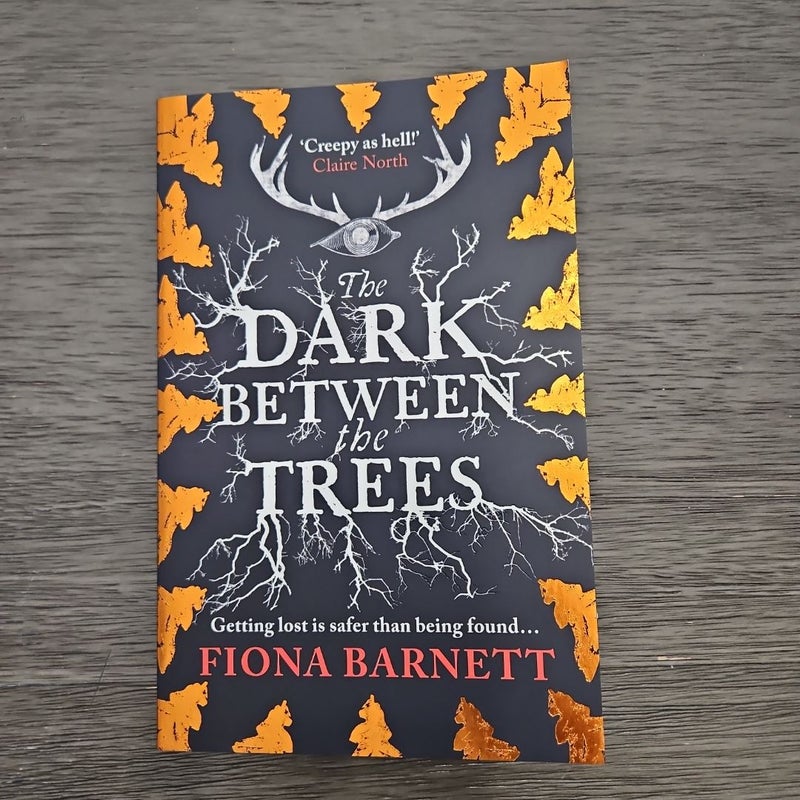 The Dark Between the Trees