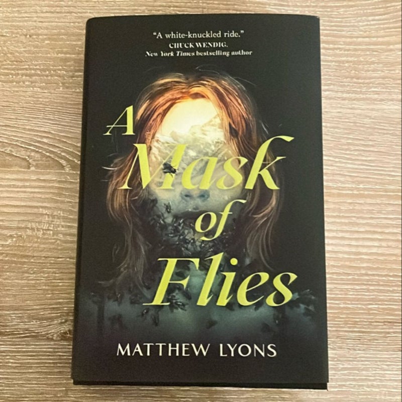 A Mask of Flies