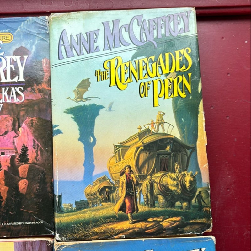 5 Hardcover Pern Books: first fall, renegades, Harper Hall of Pern, nerilka’s story, weyrs of pern. 