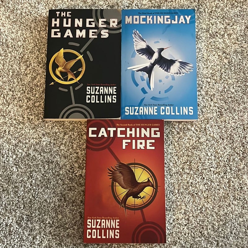 The Hunger Games, Catching Fire, and Mockingjay