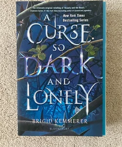 A Curse So Dark and Lonely paperback