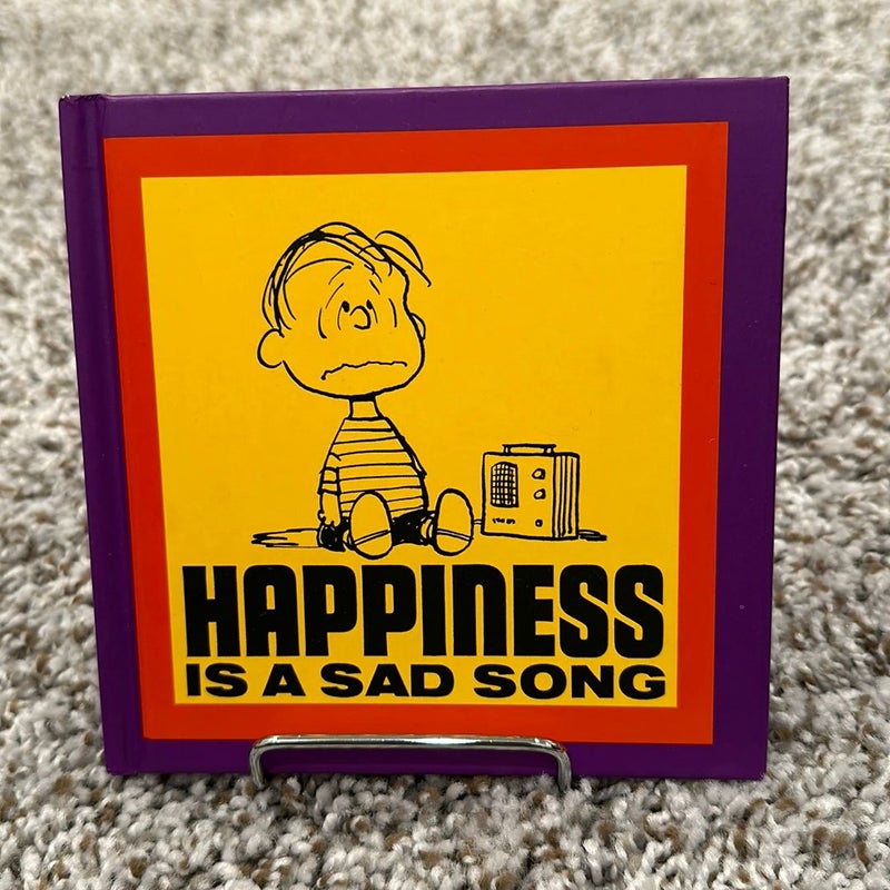 Happiness Is a Sad Song