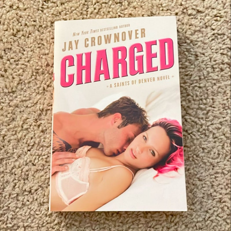 Charged (signed by the author)