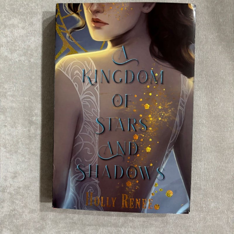 A kingdom of stars and shadows  SIGNED