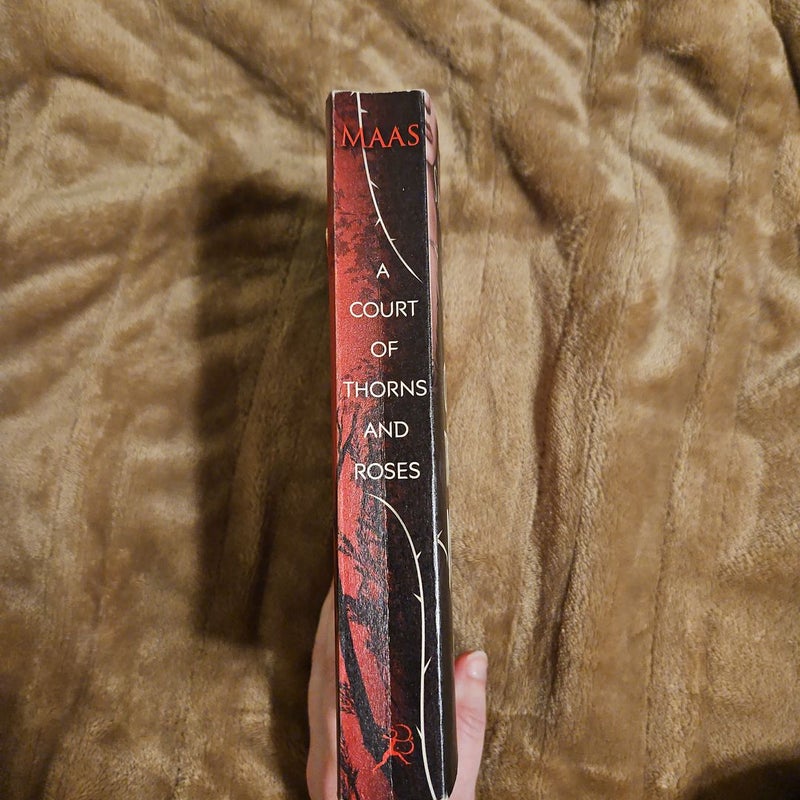 A Court of Thorns and Roses (First Edition)