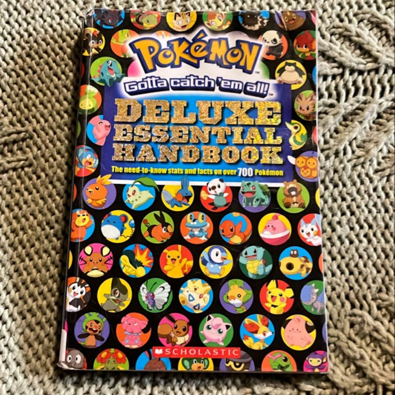 Pokemon gotta catch them all. Deluxe essential handbook.