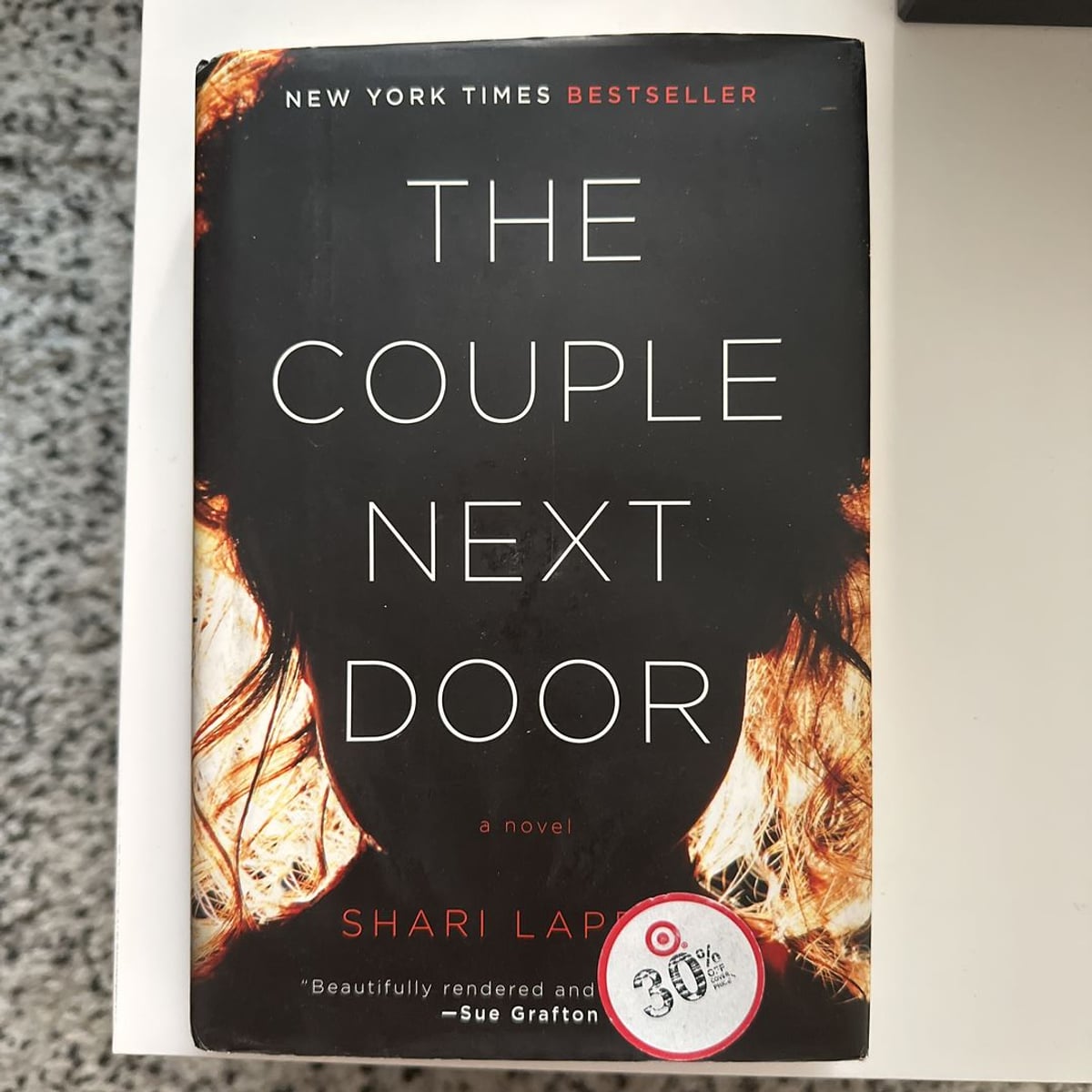 The Couple Next Door by Shari Lapena, Hardcover Pangobooks
