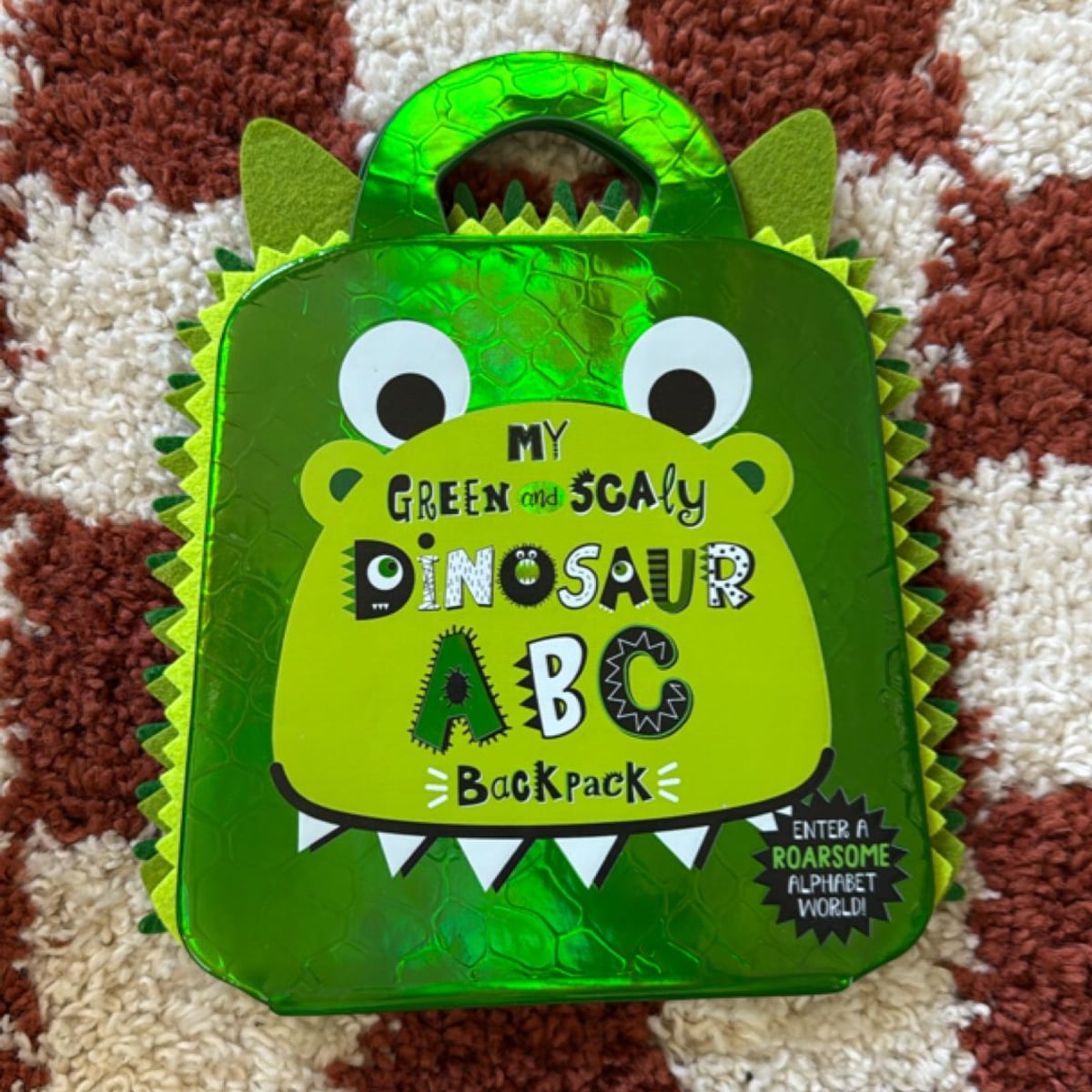 My Green and Scaly Dinosaur ABC Backpack by Alice Fewery