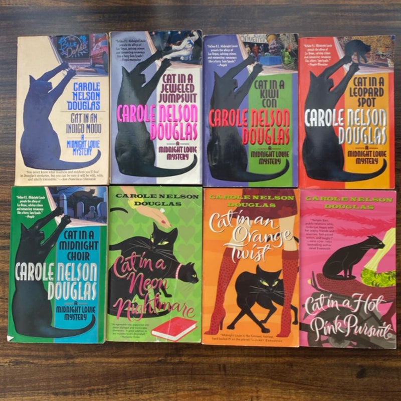 Cat in an Indigo Mood / Cat in a Jeweled Jumpsuit / Cat in a Kiwi Con / Cat in a Leopard Spot / Cat in a Midnight Choir / Cat in a Neon Nightmare / Cat in a Orange Twist / Cat in a Pink Pursuit