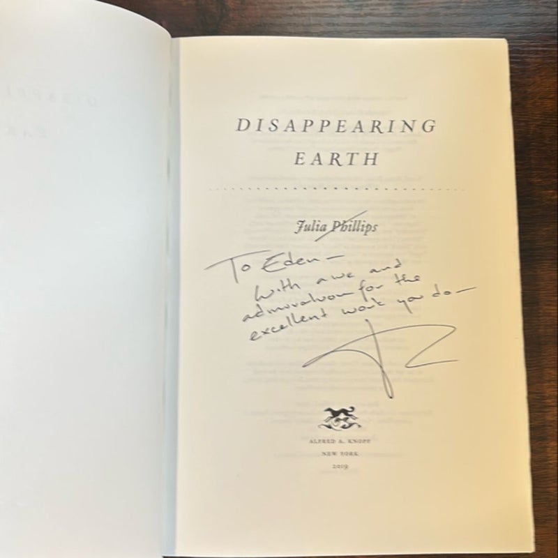 Disappearing Earth (signed by author)