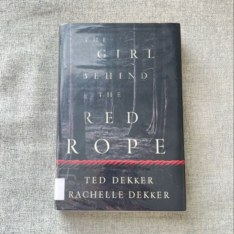 The Girl Behind the Red Rope