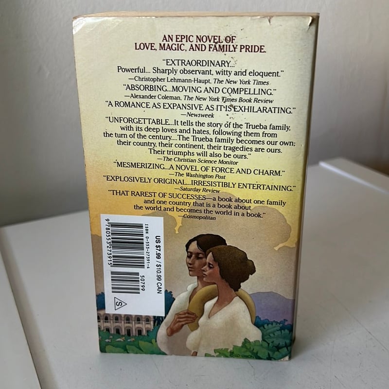 Cover of The House of the Spirits by Isabel Allende featuring a warm, inviting design